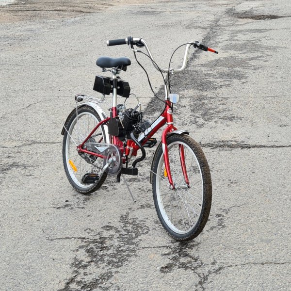 Складной велосипед с бензиновым двигателем